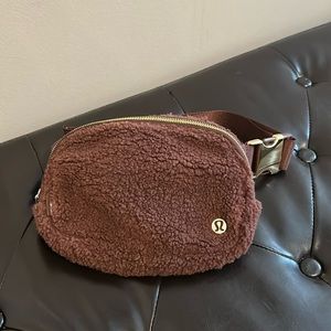 Brown lululemon Sherpa bag with gold